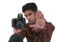 man-holding-camera.jpg